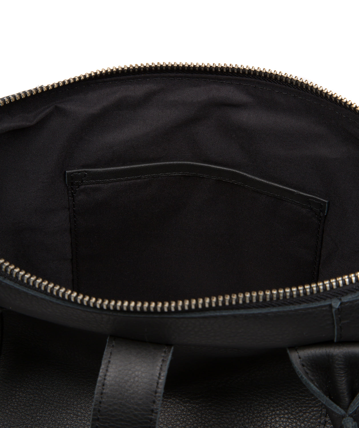 Uma tote bag rear view with folding strap closure