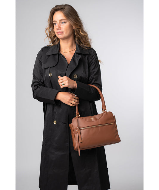 Brianna handbag side profile with rounded handles