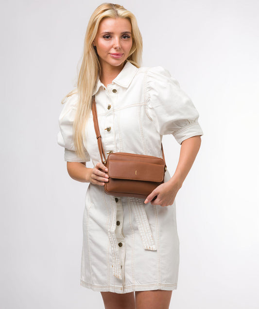 Jodie crossbody bag side profile showing adjustable shoulder strap