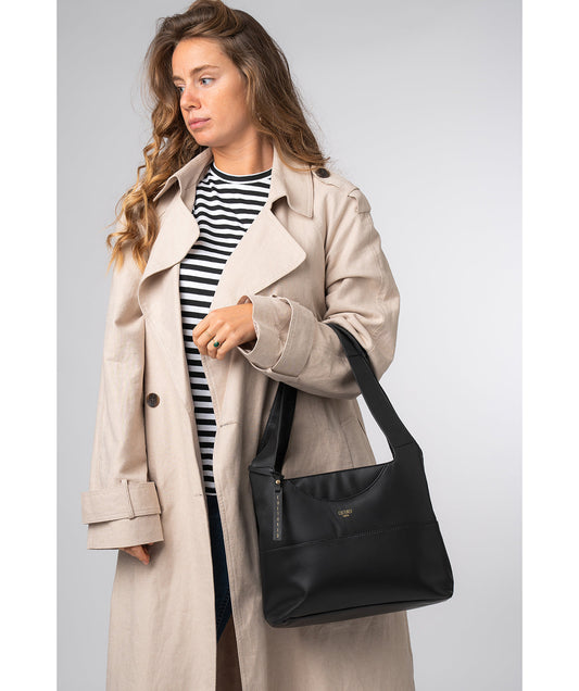 Ariel shoulder bag side profile with leather handles