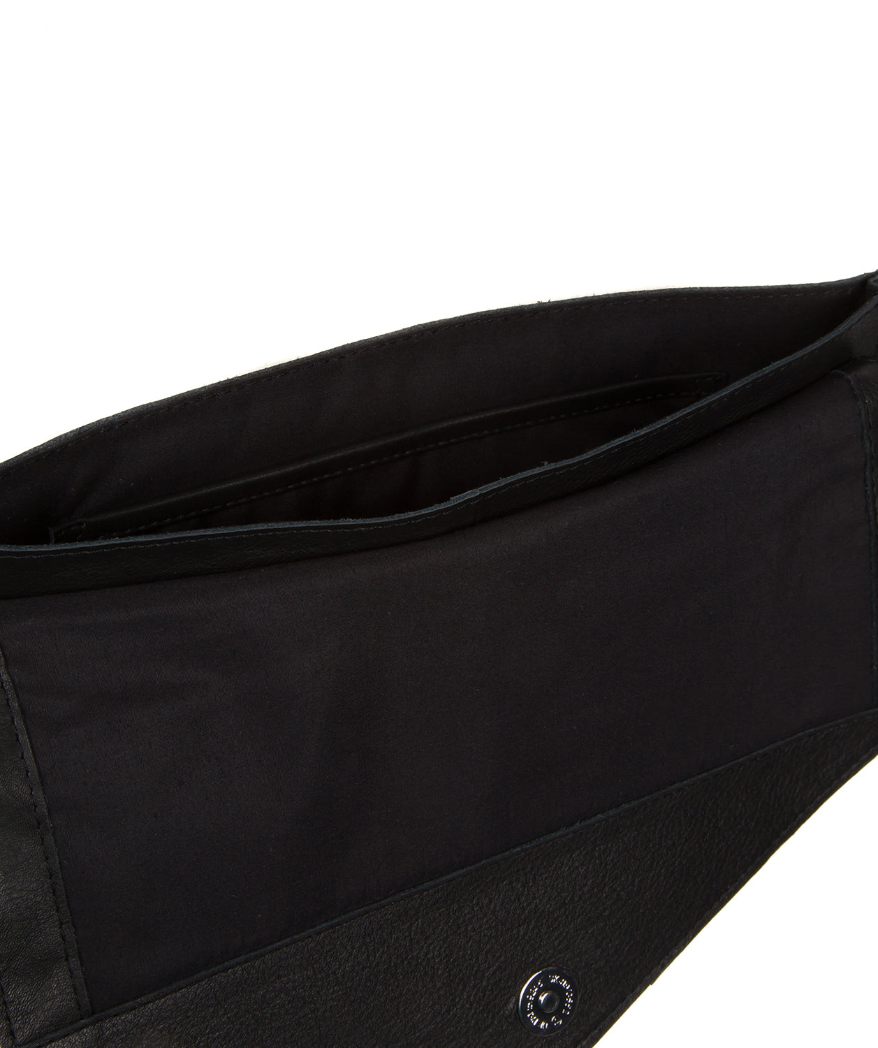 Yara black leather clutch bag held in hand
