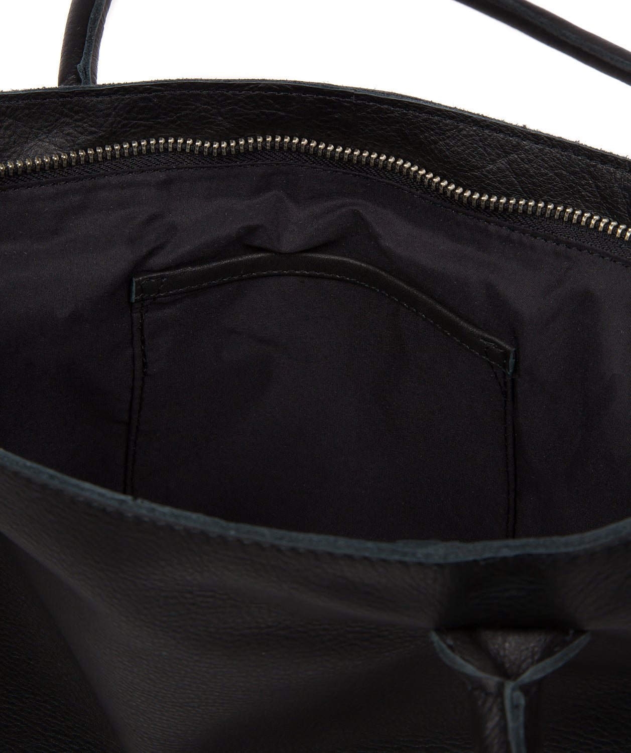 Back view of black leather tote with ergonomic handles