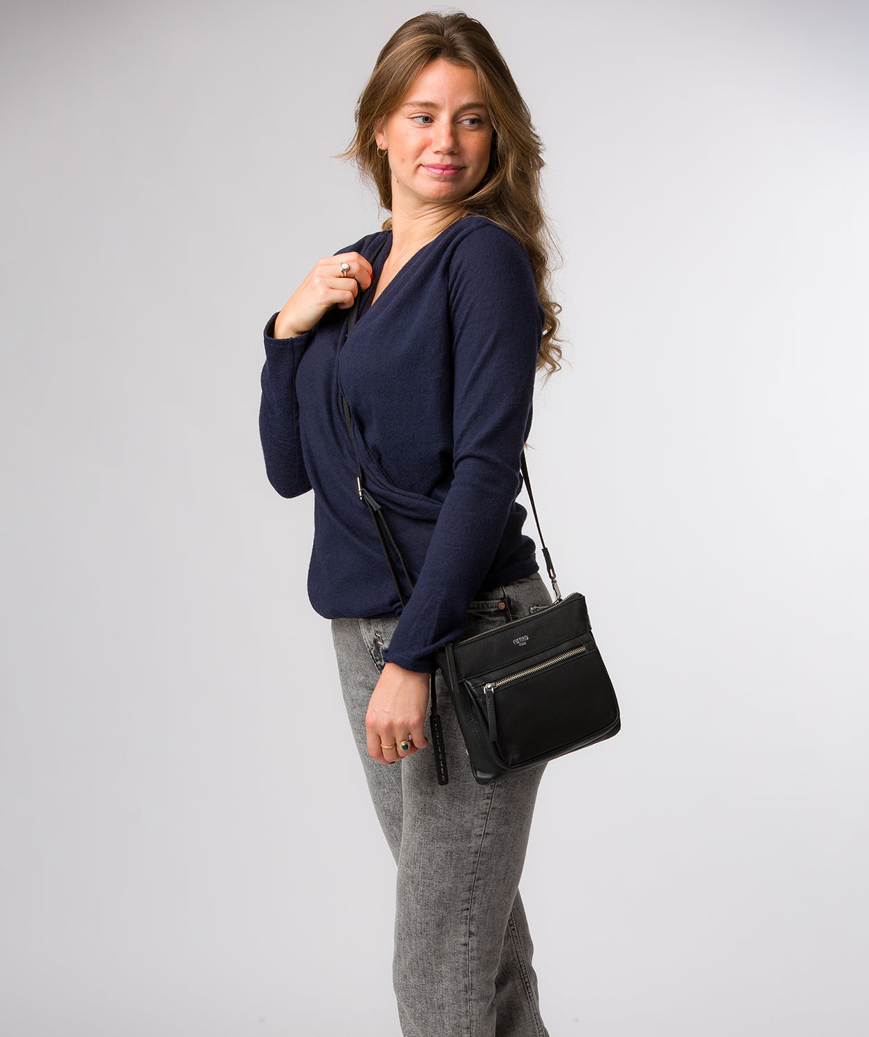 Kaia crossbody bag side profile with adjustable canvas strap