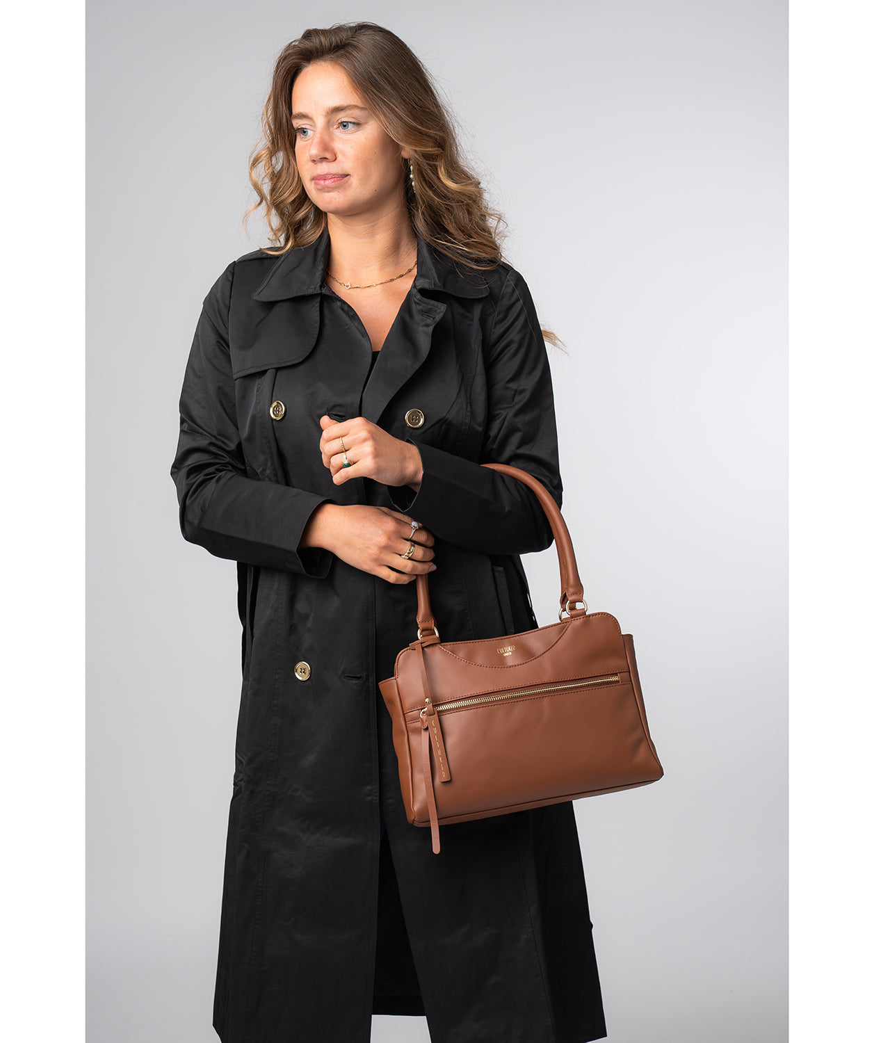 Brianna handbag side profile with rounded handles
