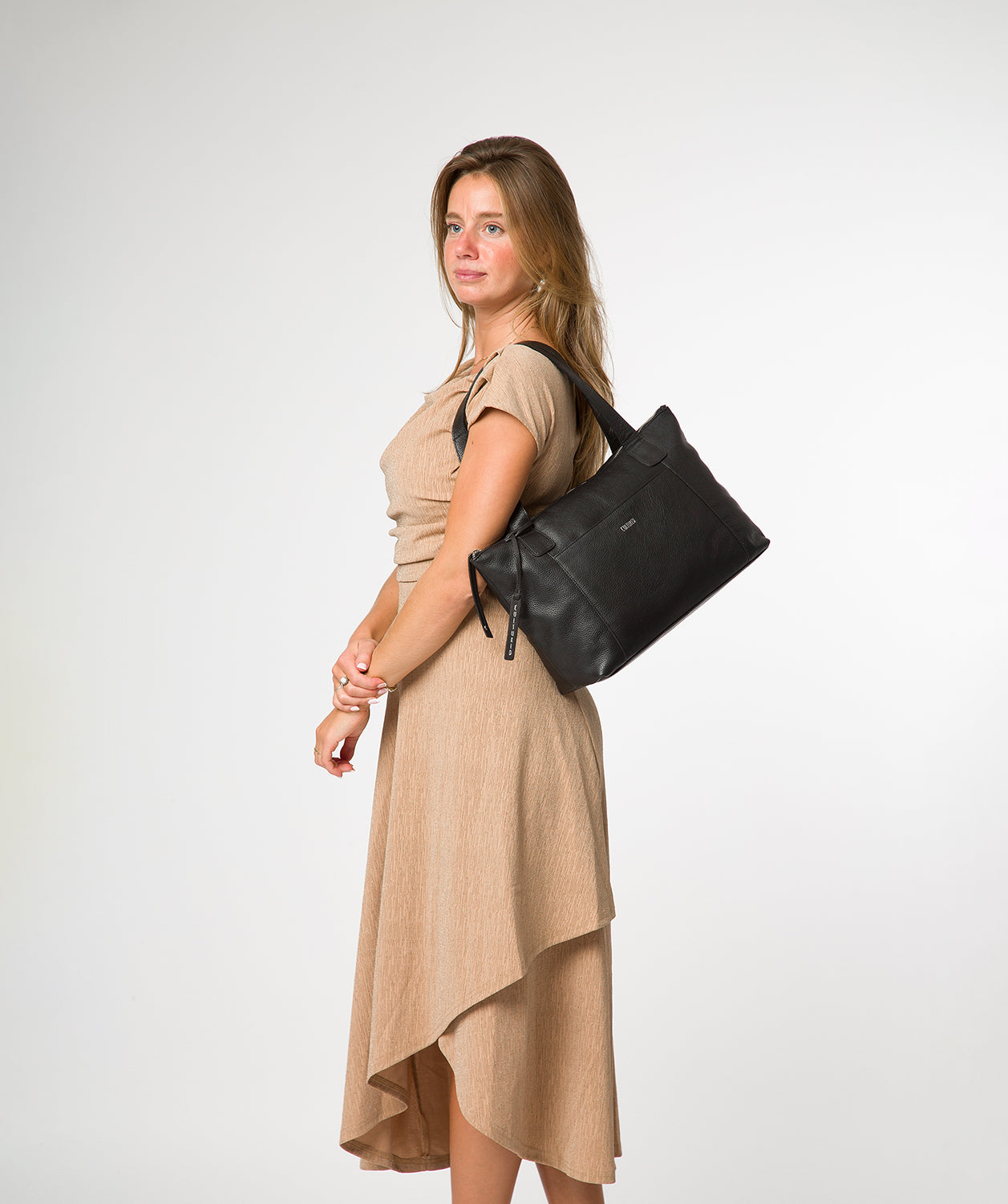 Marina tote bag side profile with leather handles