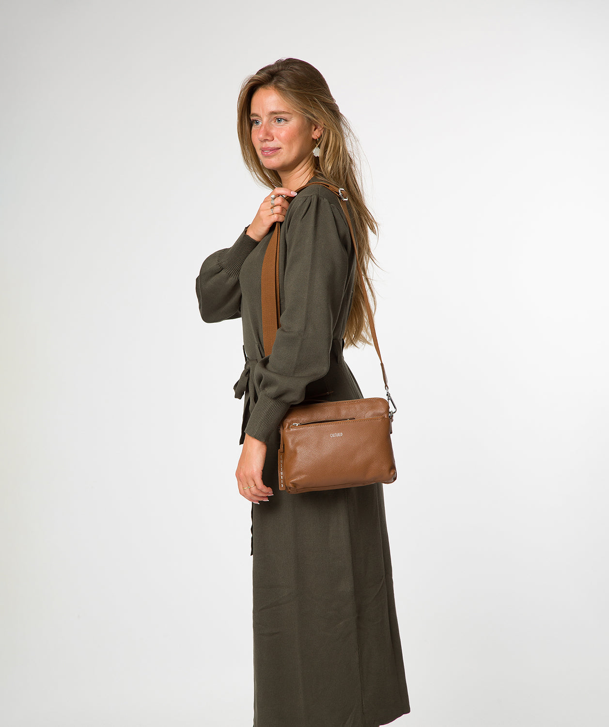 Cultured London Celia rich tan pebble grain leather crossbody bag front view