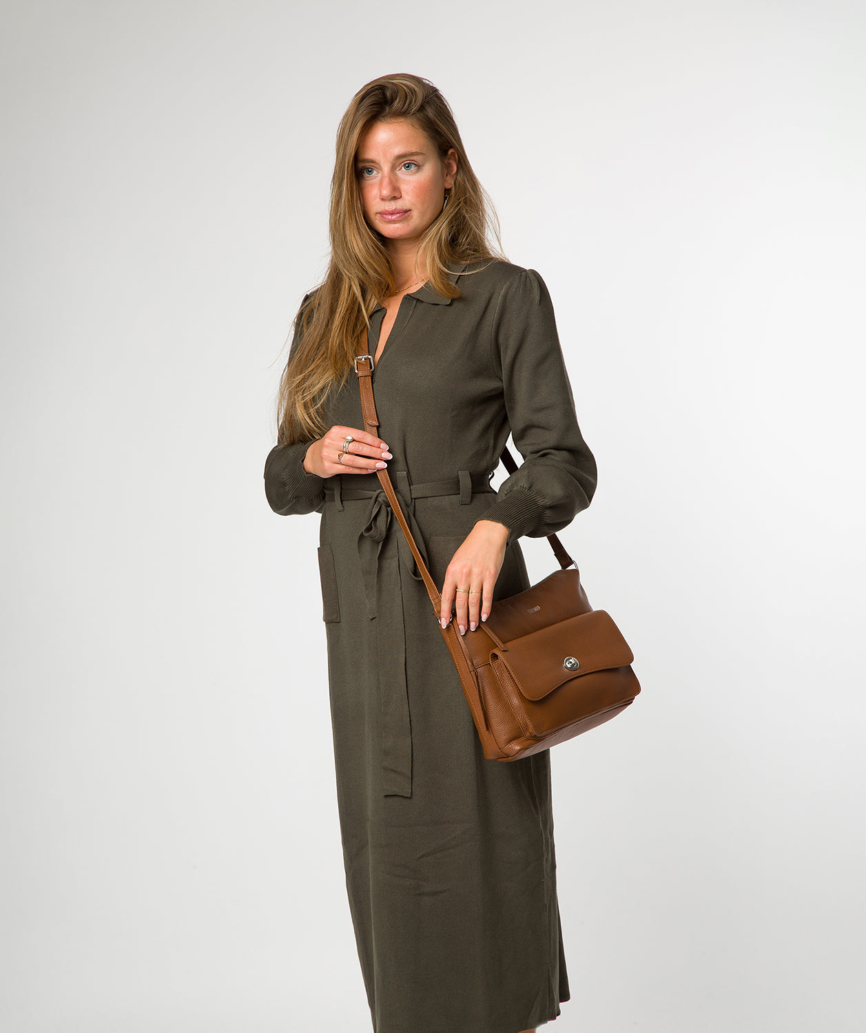 Sylvie shoulder bag side profile showing adjustable leather strap