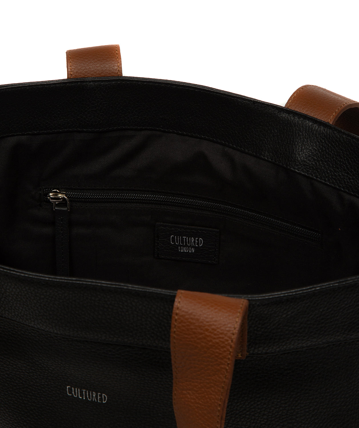 Interior slip pocket and zipped pocket storage