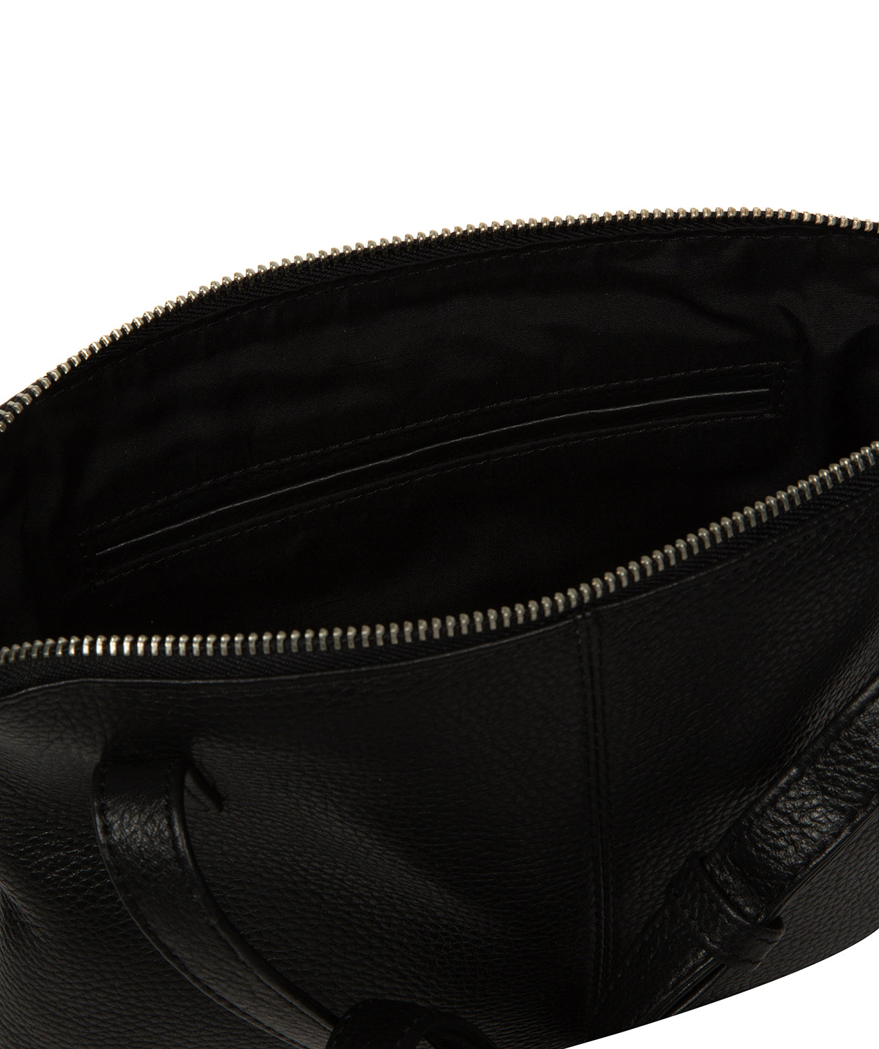 Crossbody bag worn across body showing strap drop and proportions